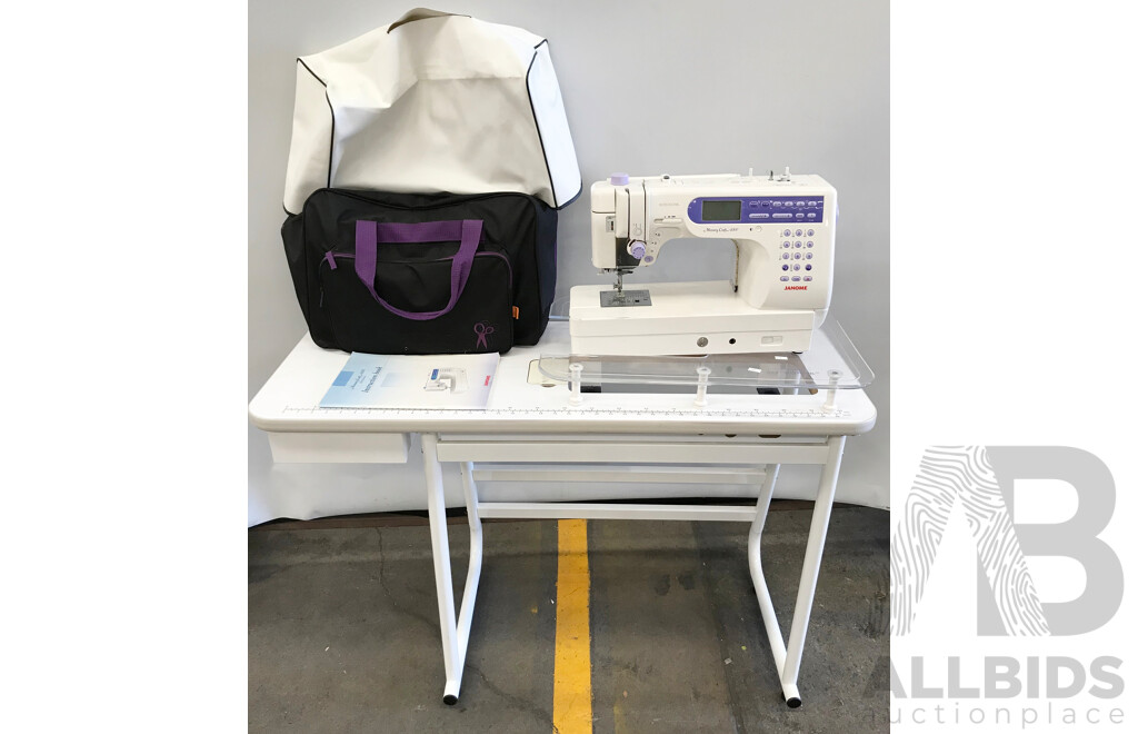 Janome Memory Craft 6500 Professional Sewing Machine with Table and Accessories