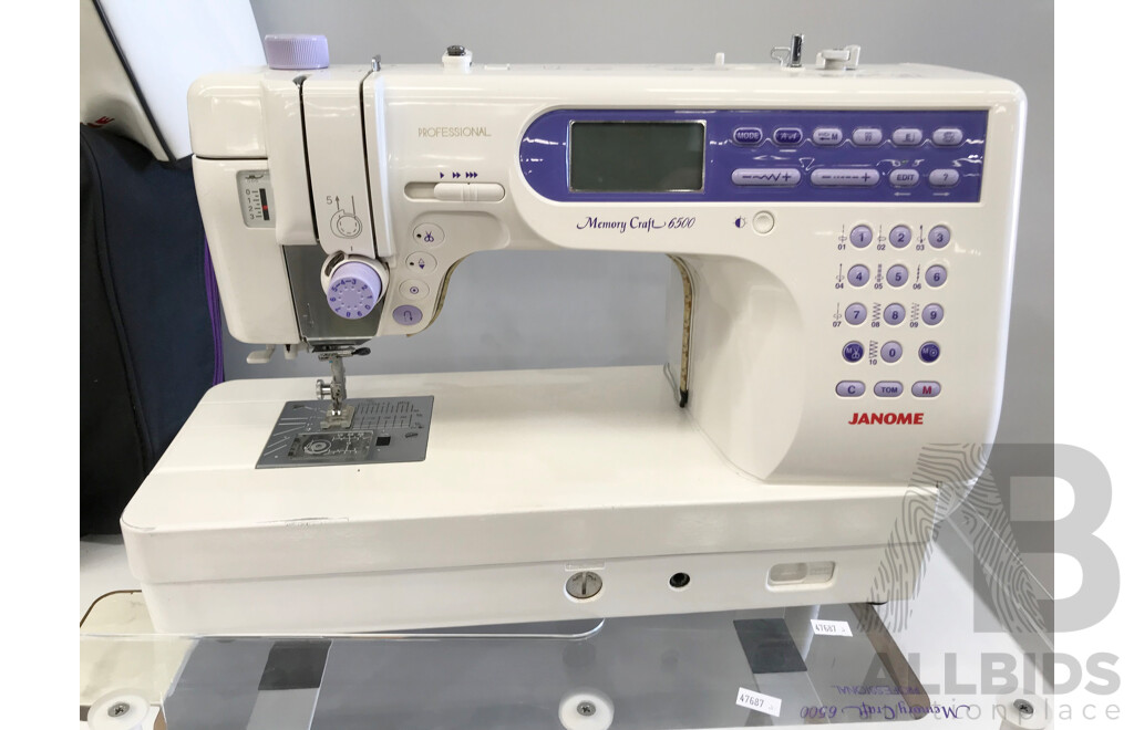 Janome Memory Craft 6500 Professional Sewing Machine with Table and Accessories