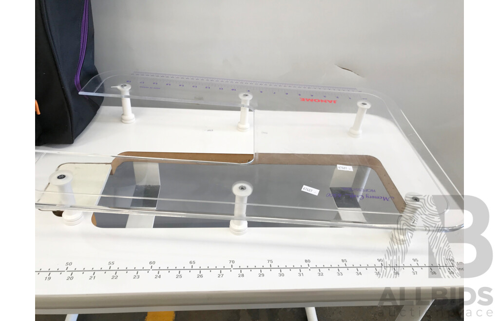 Janome Memory Craft 6500 Professional Sewing Machine with Table and Accessories