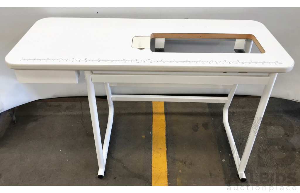 Janome Memory Craft 6500 Professional Sewing Machine with Table and Accessories