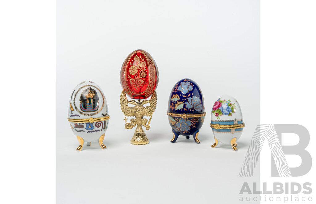 Collection Four Lidded Ceramic Eggs and Ruby Crystal with Etched Floral Detail Example Labeled Faberge to Base on Brass Stand