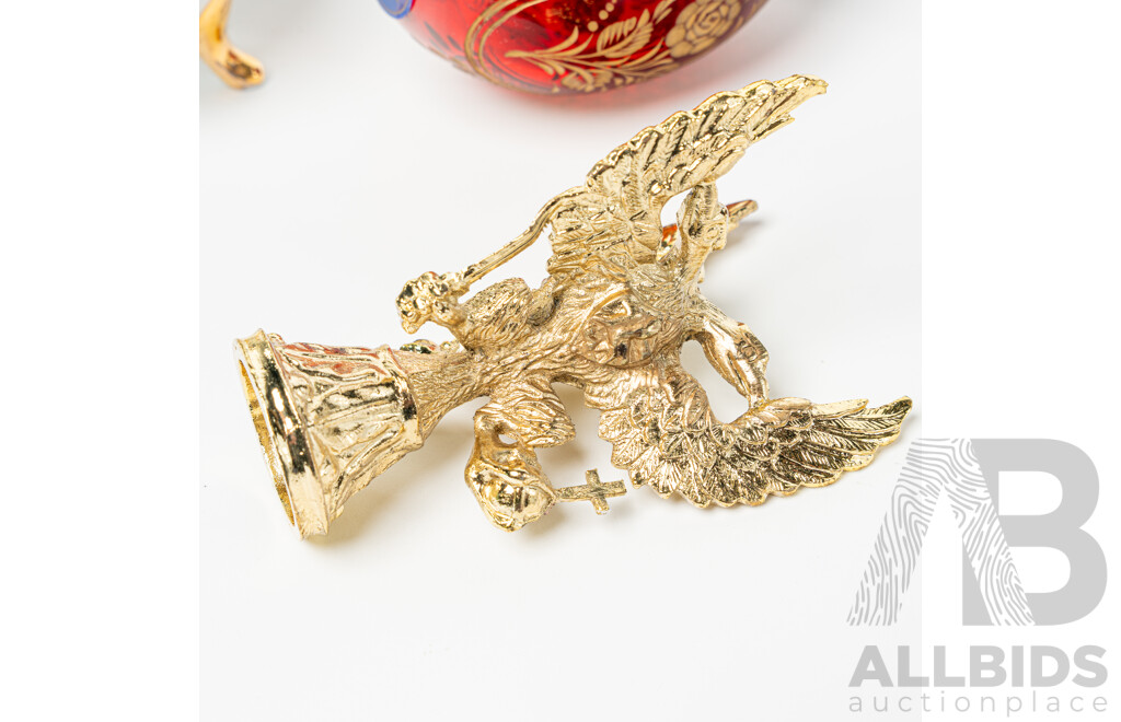 Collection Four Lidded Ceramic Eggs and Ruby Crystal with Etched Floral Detail Example Labeled Faberge to Base on Brass Stand