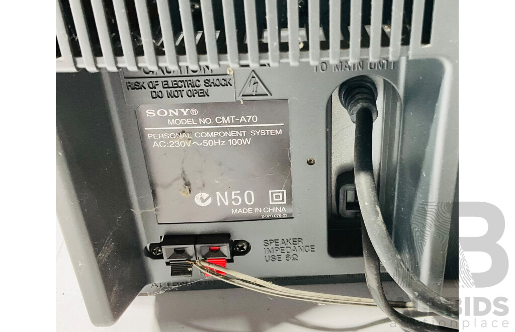 Sony Personal Component System Including Two Speakers, Radio, CD and Cassette System CMT-A70, Remote Control and Operating Instruction Booklet