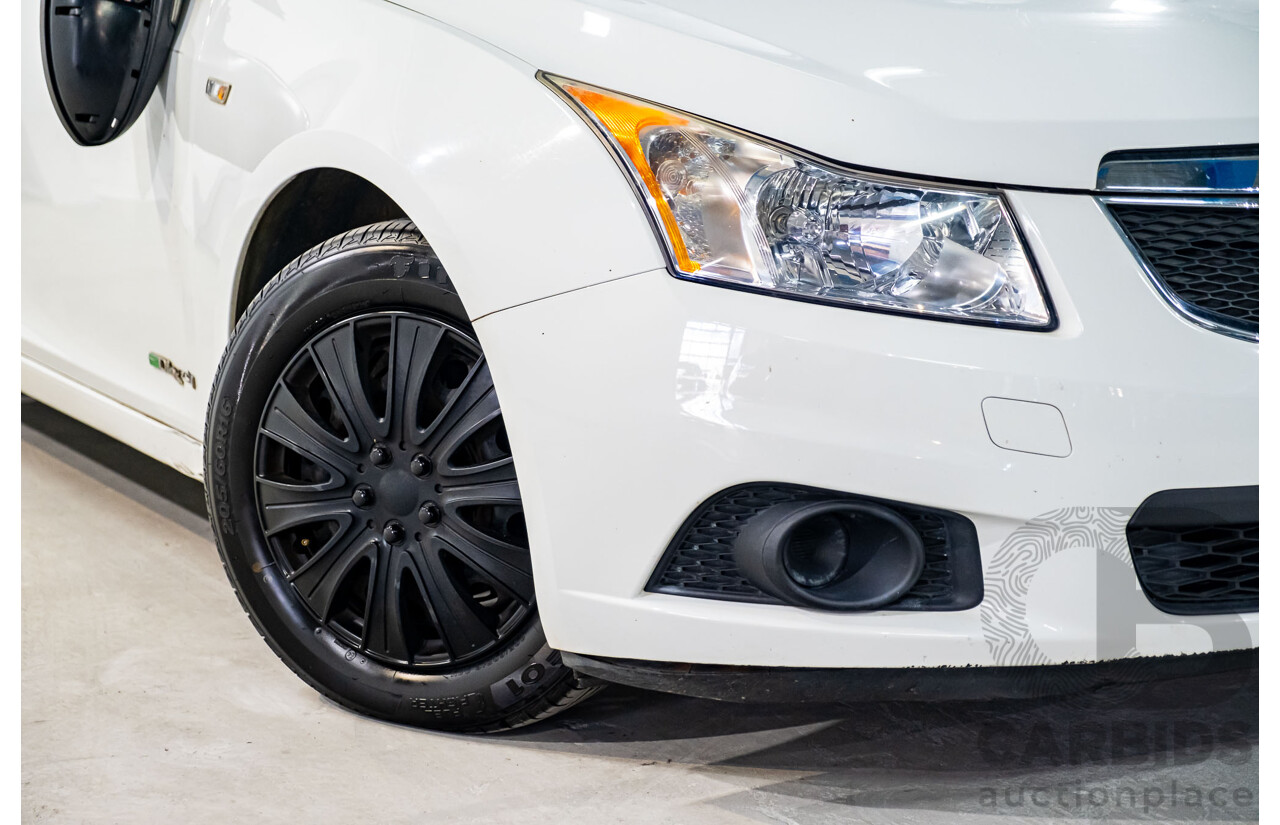 5/2011 Holden Cruze CD JH 4d Sedan White Turbo Diesel 2.0L