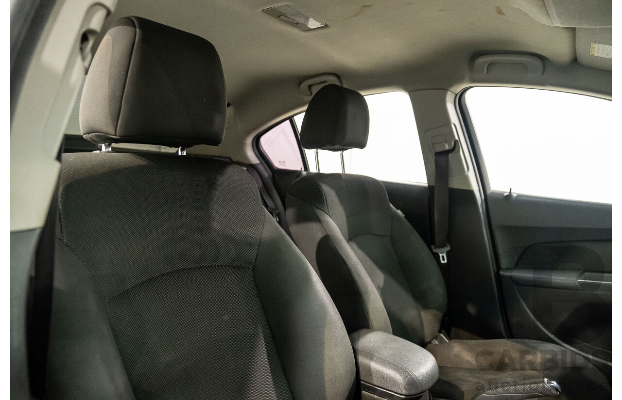 5/2011 Holden Cruze CD JH 4d Sedan White Turbo Diesel 2.0L