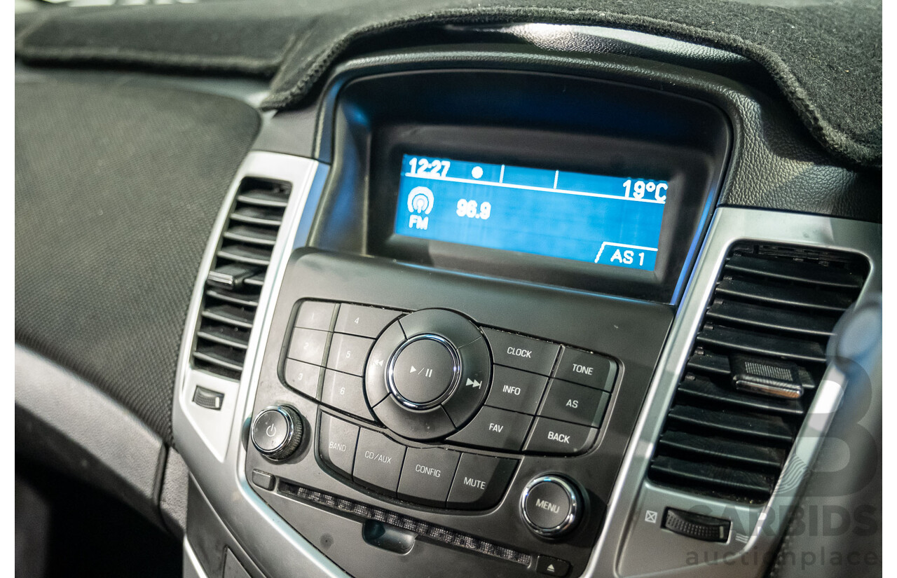 5/2011 Holden Cruze CD JH 4d Sedan White Turbo Diesel 2.0L