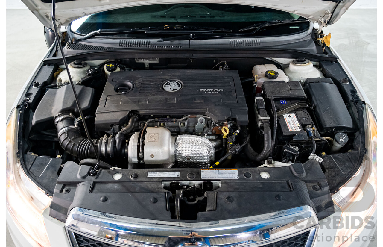 5/2011 Holden Cruze CD JH 4d Sedan White Turbo Diesel 2.0L