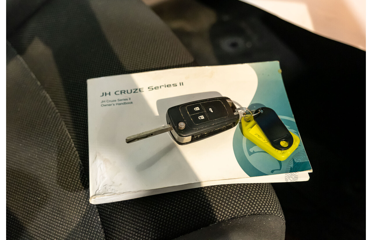 5/2011 Holden Cruze CD JH 4d Sedan White Turbo Diesel 2.0L