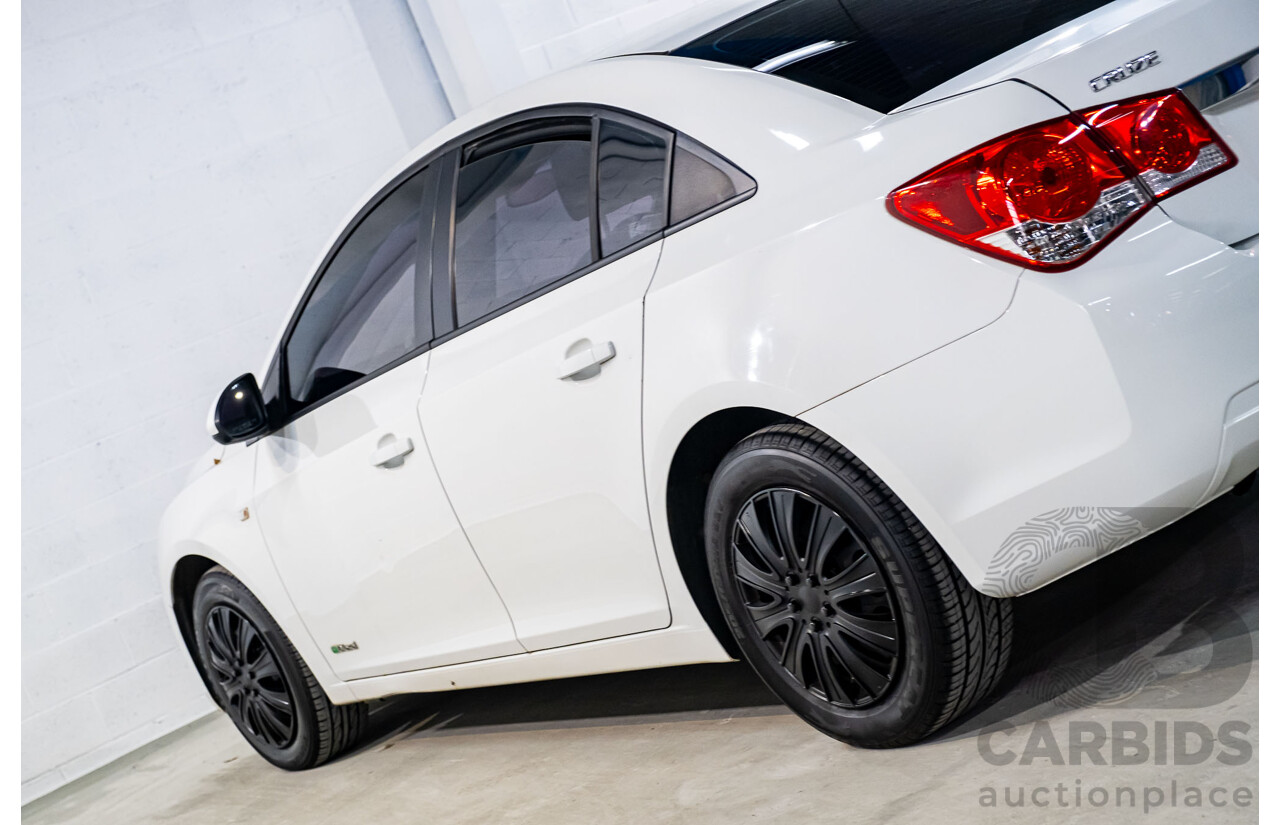 5/2011 Holden Cruze CD JH 4d Sedan White Turbo Diesel 2.0L