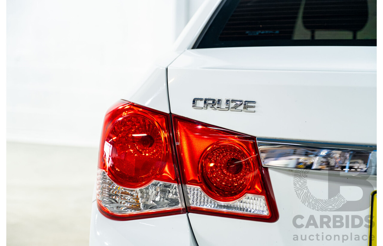 5/2011 Holden Cruze CD JH 4d Sedan White Turbo Diesel 2.0L