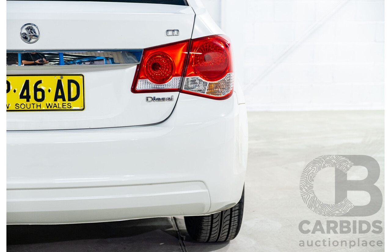 5/2011 Holden Cruze CD JH 4d Sedan White Turbo Diesel 2.0L