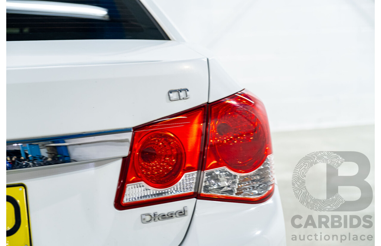 5/2011 Holden Cruze CD JH 4d Sedan White Turbo Diesel 2.0L