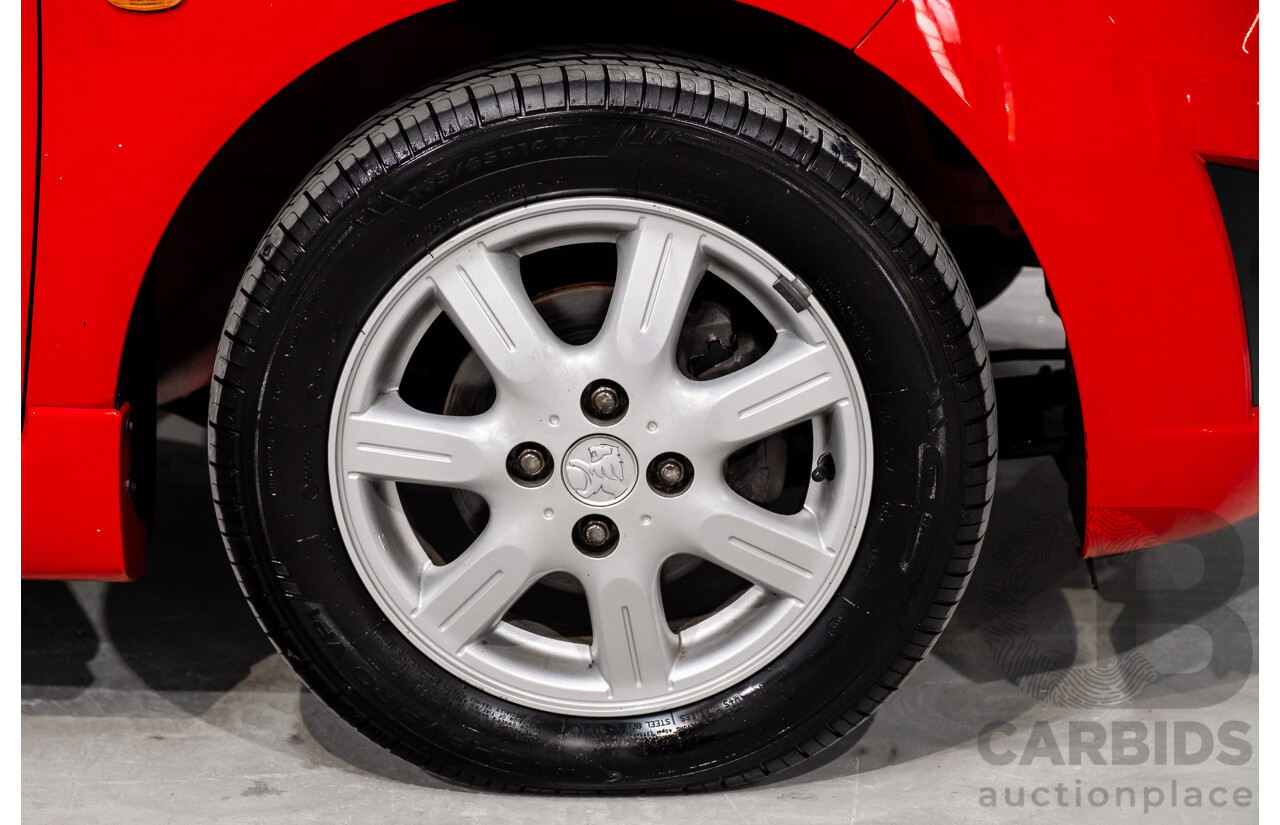 11/2010 Holden Barina Spark CD MJ 5d Hatchback Red 1.2L