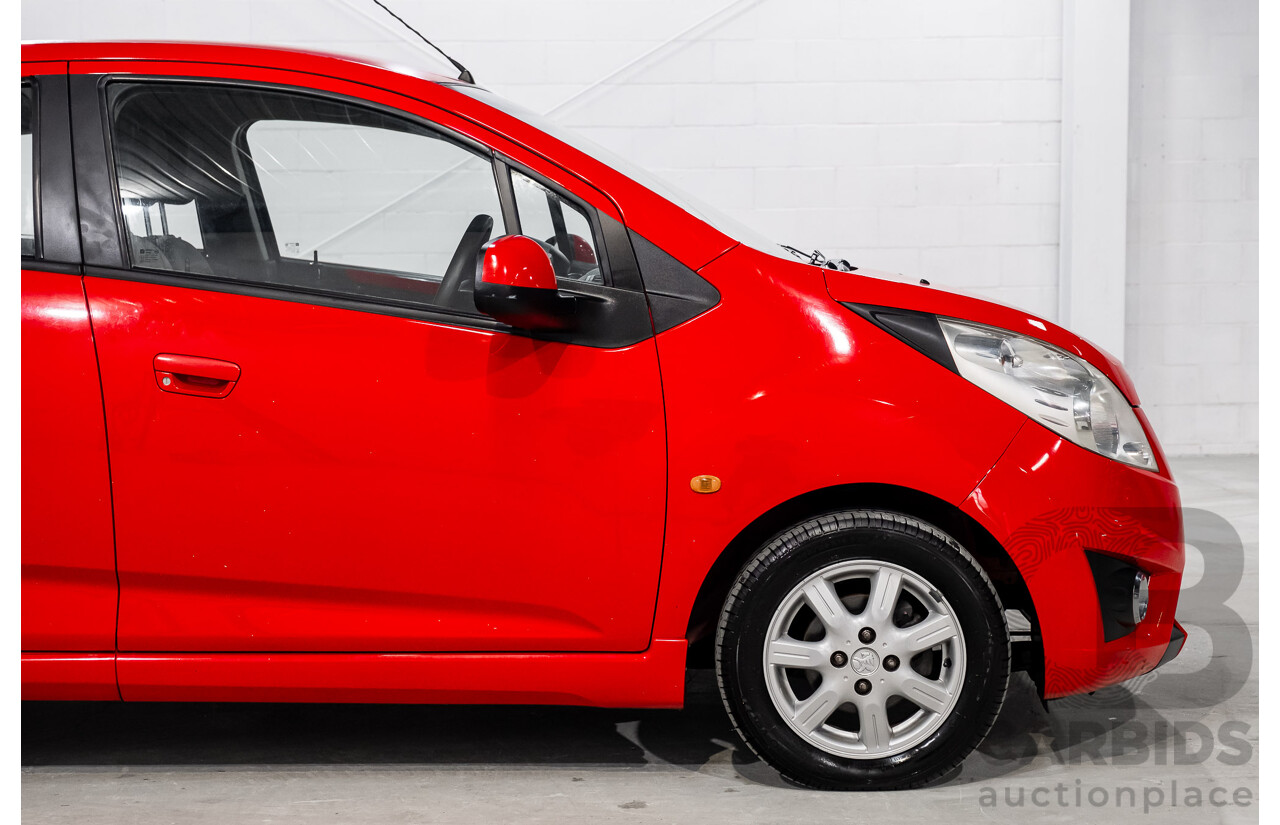 11/2010 Holden Barina Spark CD MJ 5d Hatchback Red 1.2L