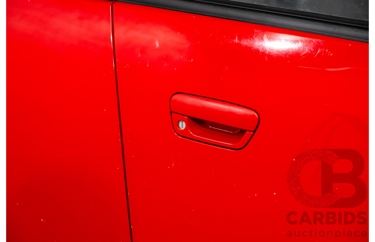 11/2010 Holden Barina Spark CD MJ 5d Hatchback Red 1.2L