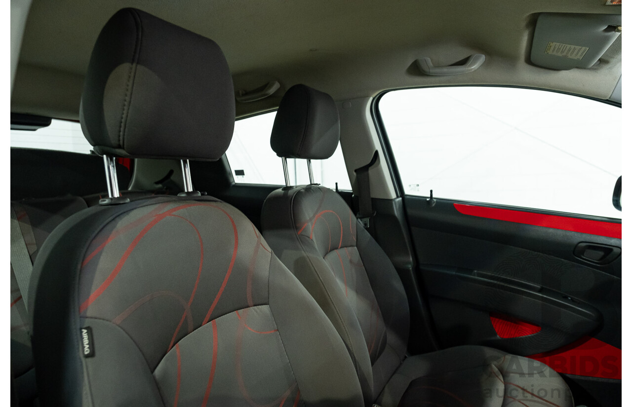 11/2010 Holden Barina Spark CD MJ 5d Hatchback Red 1.2L