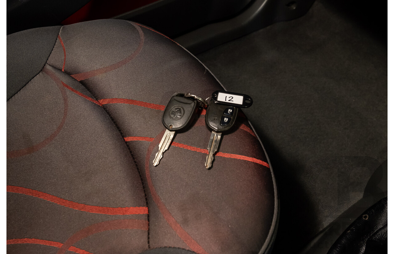 11/2010 Holden Barina Spark CD MJ 5d Hatchback Red 1.2L