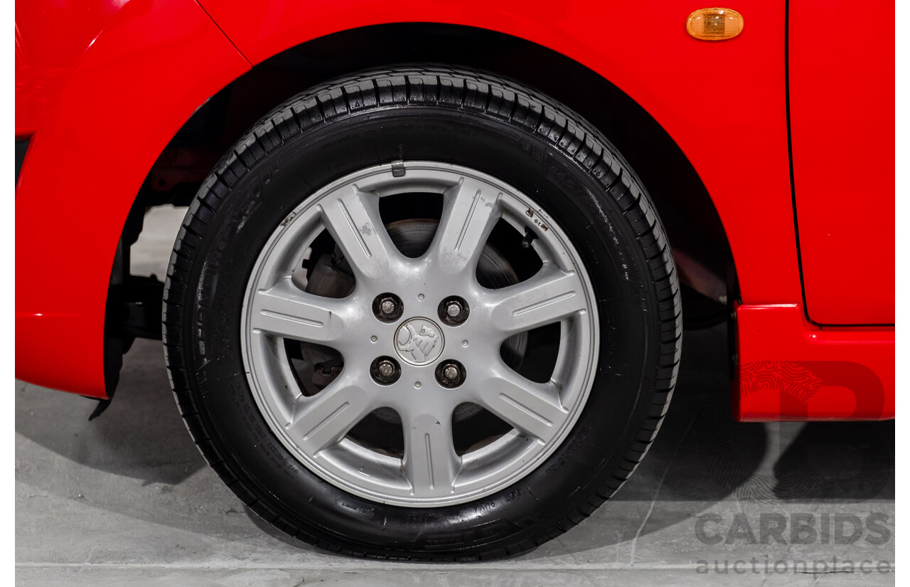 11/2010 Holden Barina Spark CD MJ 5d Hatchback Red 1.2L