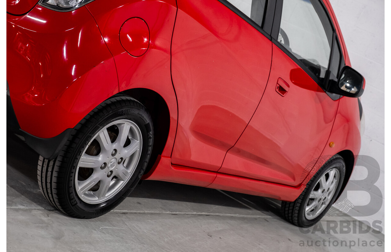 11/2010 Holden Barina Spark CD MJ 5d Hatchback Red 1.2L