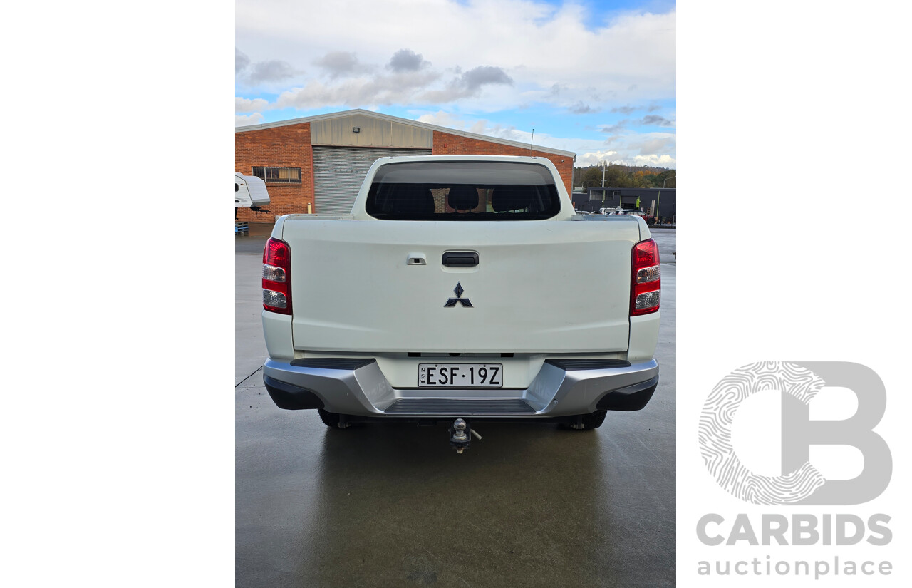 2/2017 Mitsubishi Triton GLS (4x4) MQ MY16 Dual Cab Utility White Turbo Diesel 2.4L