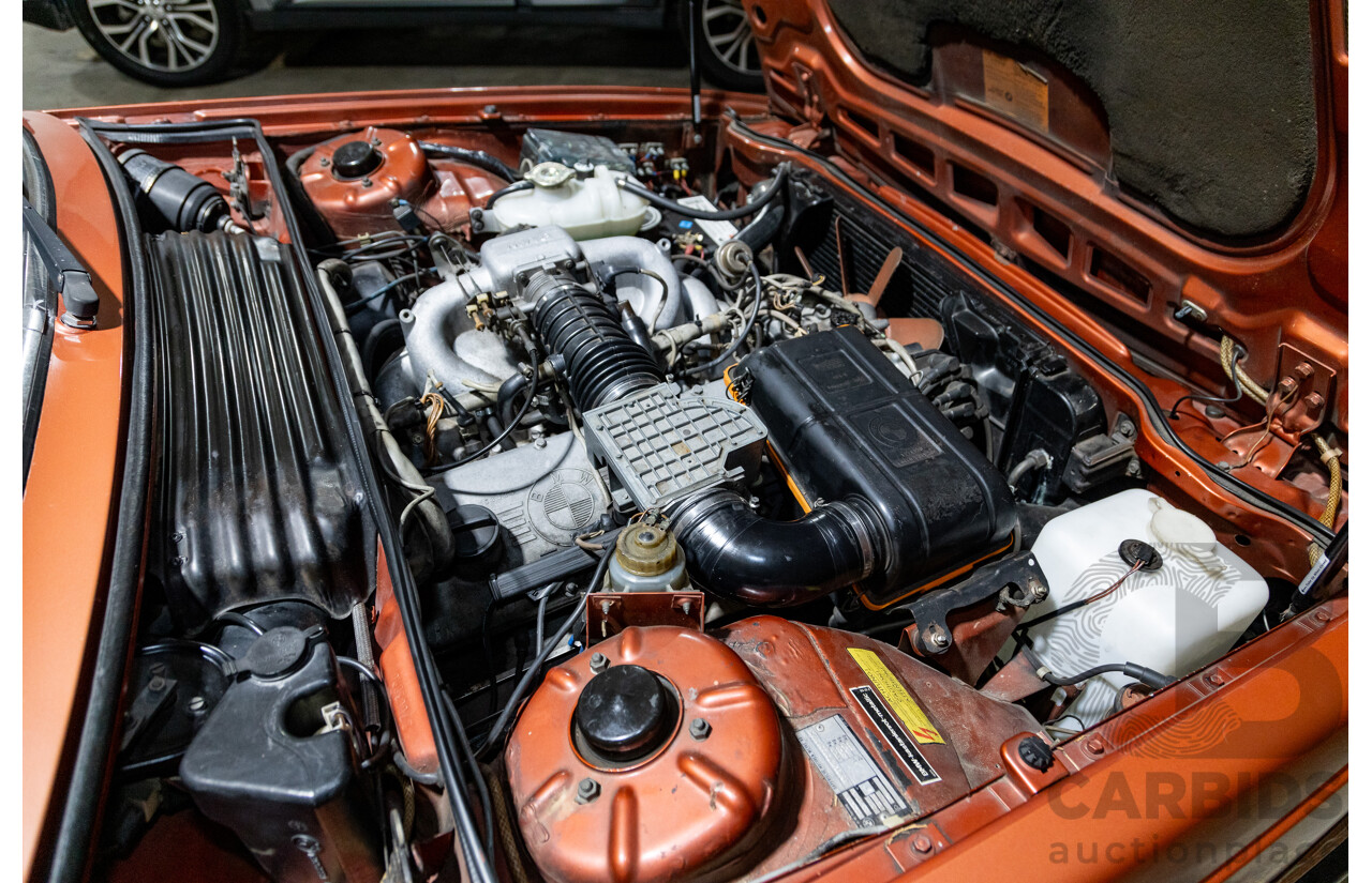 6/1982 BMW 635CSi A E24 2d Coupe Kastanienrot Metallic Red 3.4L - South African Import from the 1980s