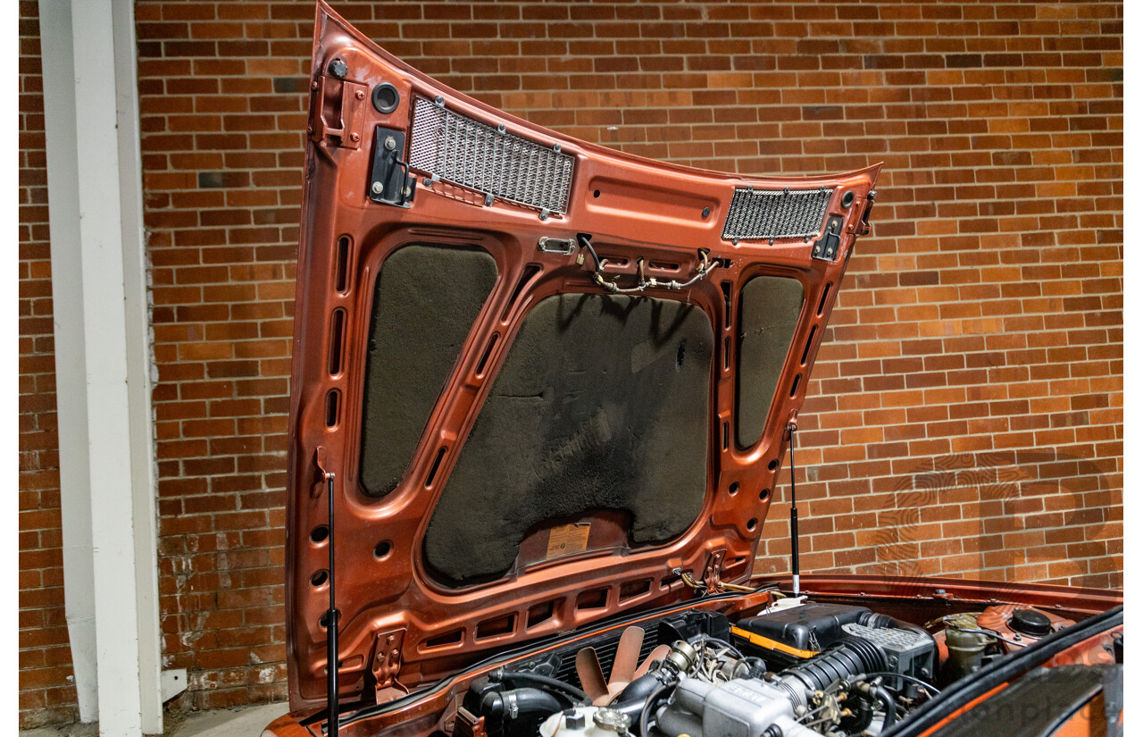 6/1982 BMW 635CSi A E24 2d Coupe Kastanienrot Metallic Red 3.4L - South African Import from the 1980s