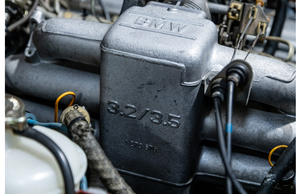 6/1982 BMW 635CSi A E24 2d Coupe Kastanienrot Metallic Red 3.4L - South African Import from the 1980s