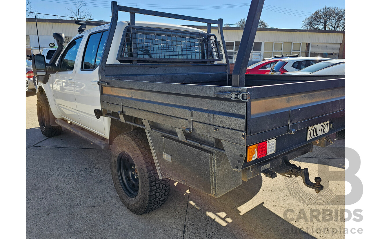 4/2010 Nissan Navara ST (4x4) D40 Dual Cab P/Up White 2.5L