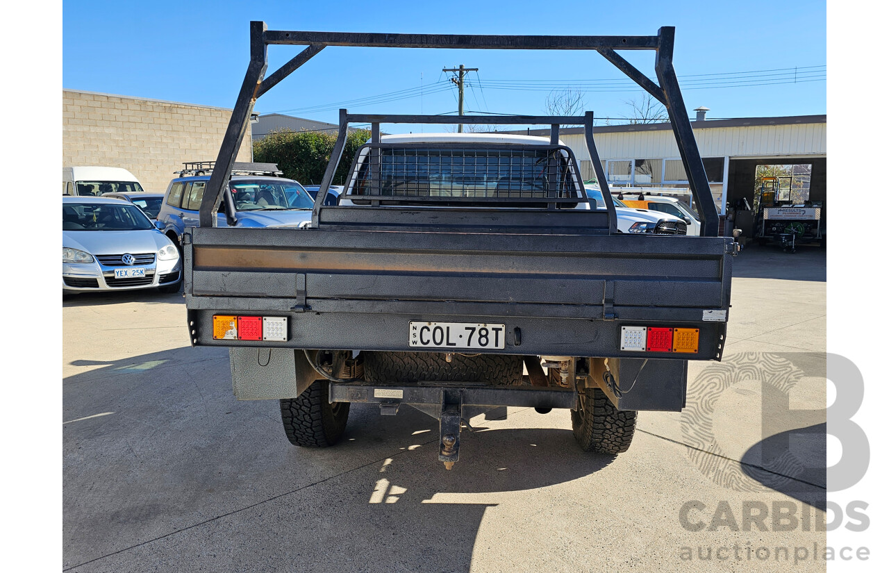 4/2010 Nissan Navara ST (4x4) D40 Dual Cab P/Up White 2.5L