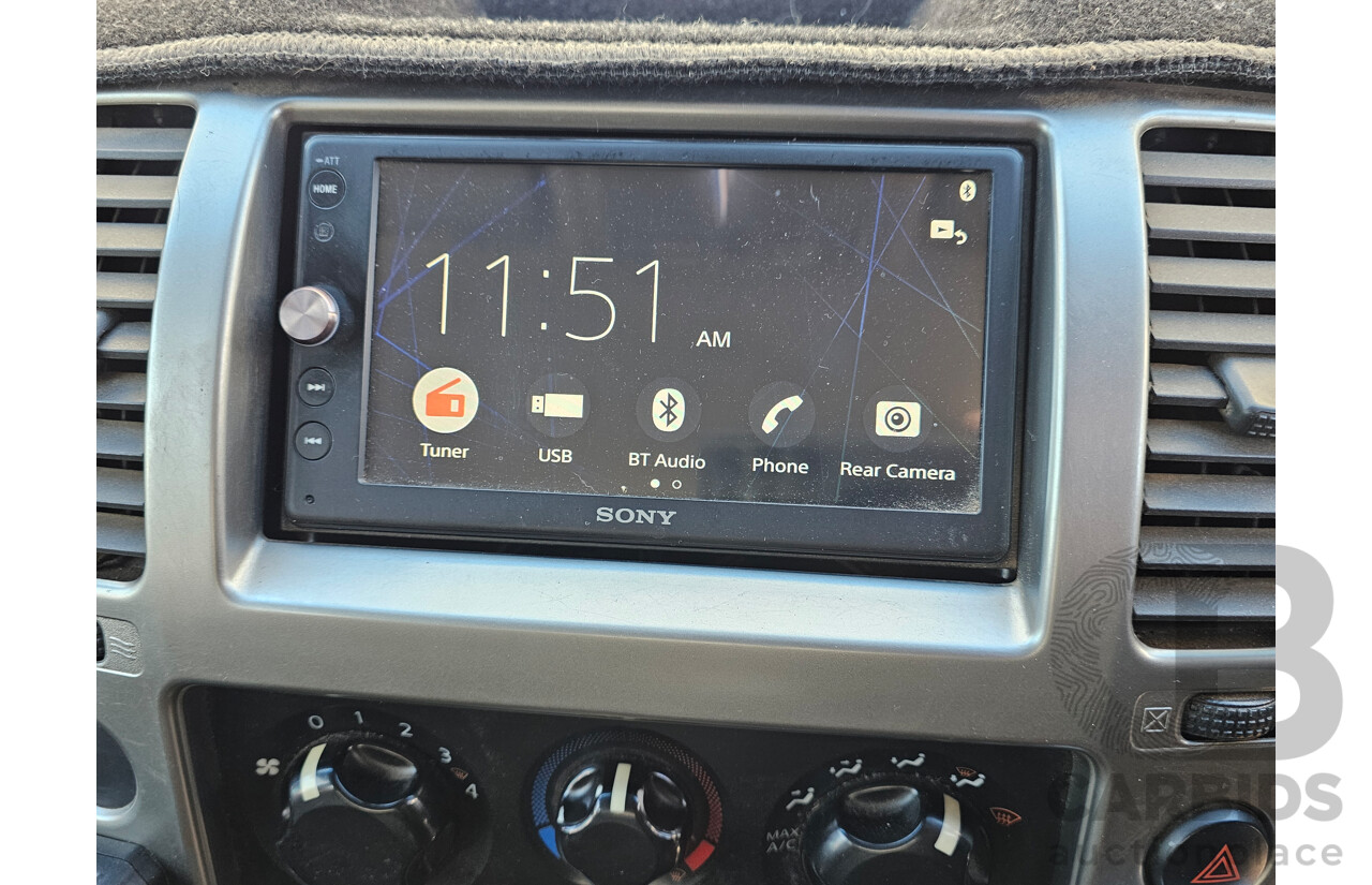 4/2010 Nissan Navara ST (4x4) D40 Dual Cab P/Up White 2.5L