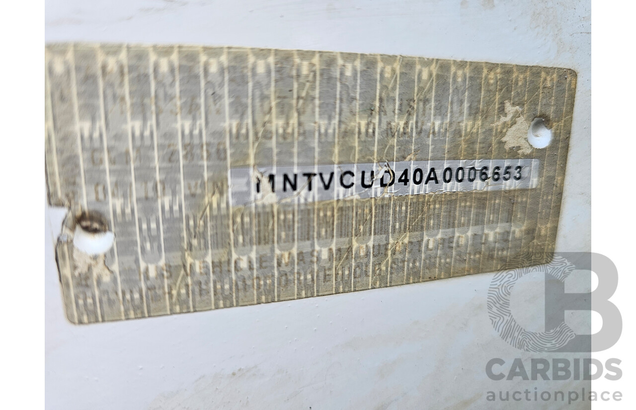 4/2010 Nissan Navara ST (4x4) D40 Dual Cab P/Up White 2.5L