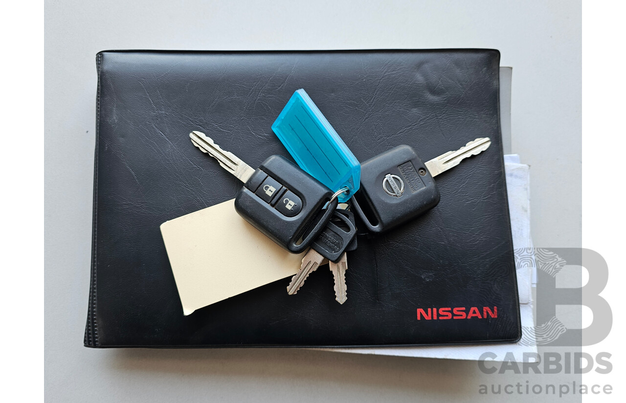 4/2010 Nissan Navara ST (4x4) D40 Dual Cab P/Up White 2.5L