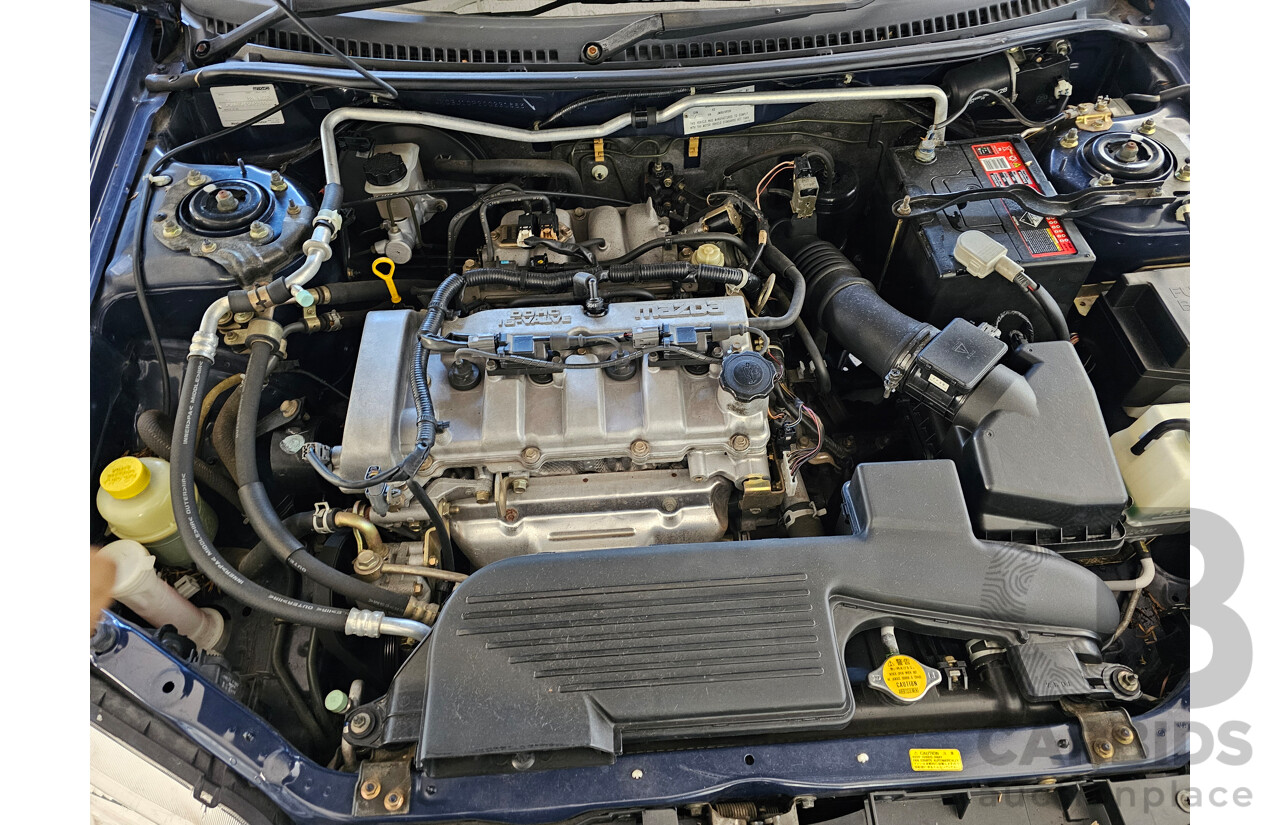 8/2002 Mazda 323 Astina  5d Hatchback Blue 1.8L