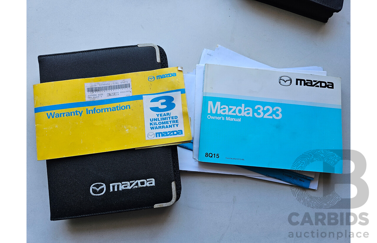 8/2002 Mazda 323 Astina  5d Hatchback Blue 1.8L