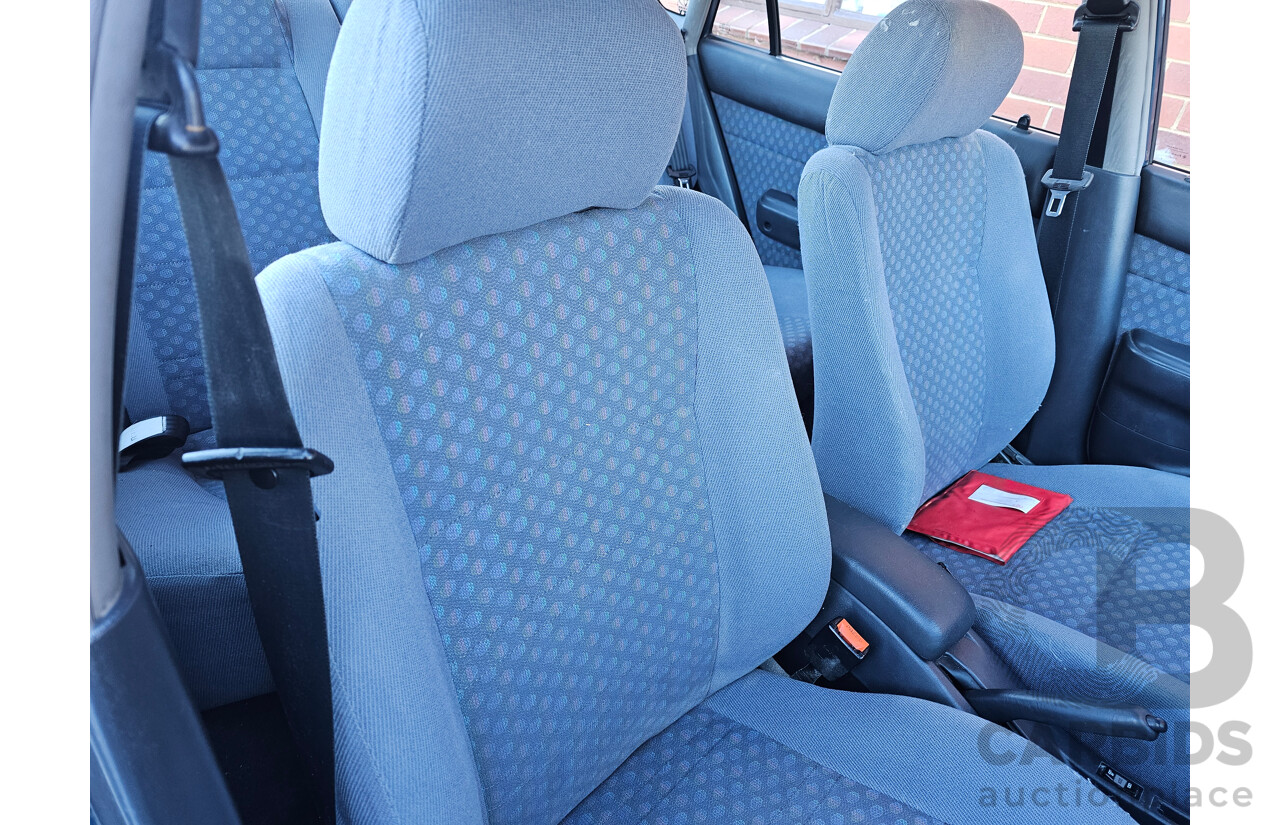 2/1999 Toyota Corolla CSi SECA AE101R 5d Liftback Blue 1.6L