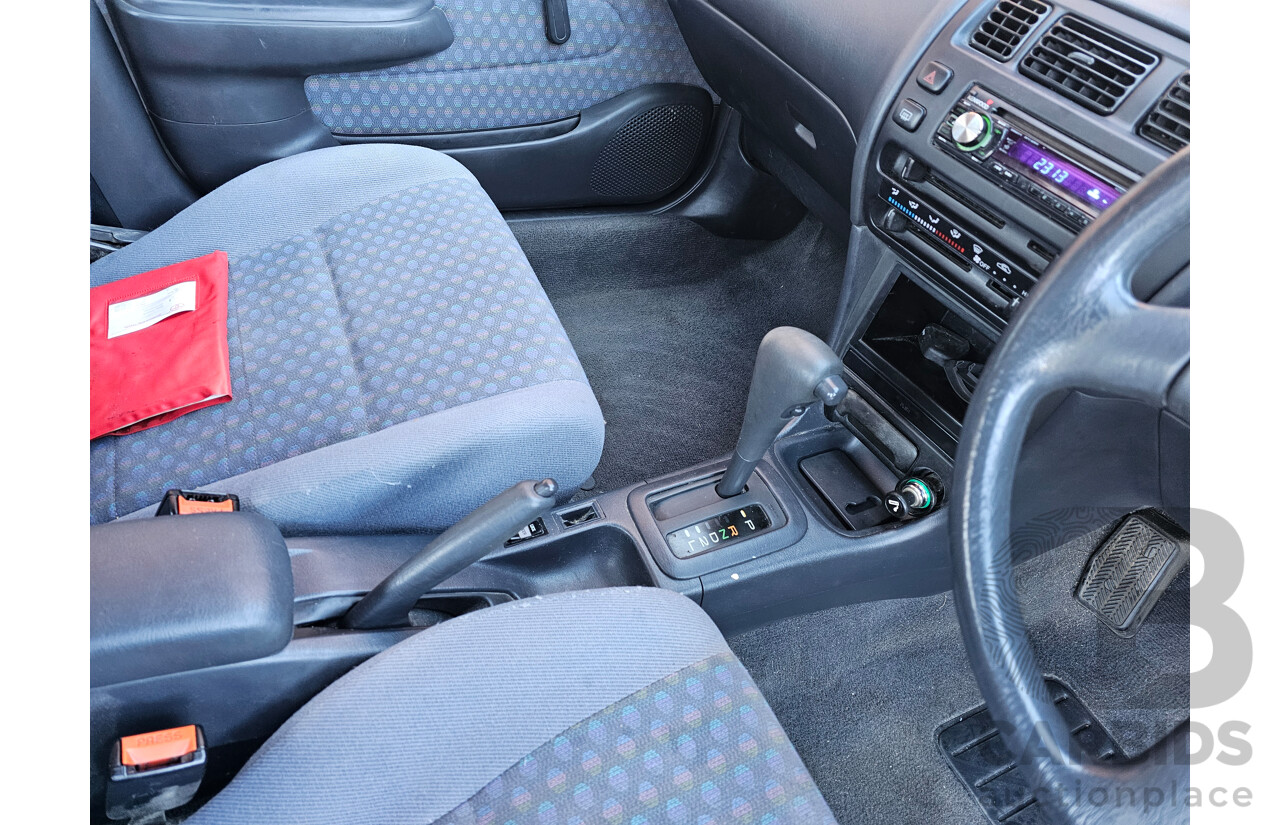 2/1999 Toyota Corolla CSi SECA AE101R 5d Liftback Blue 1.6L