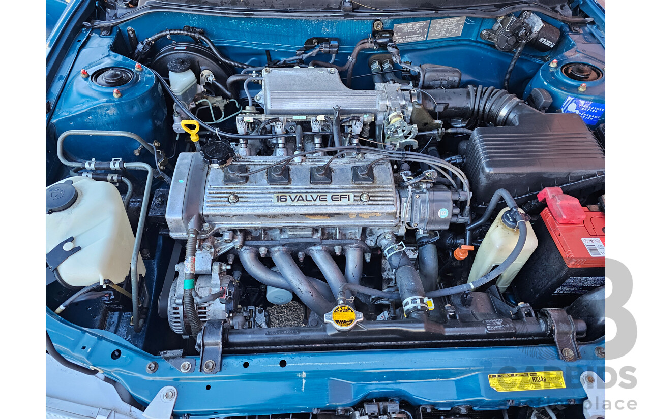 2/1999 Toyota Corolla CSi SECA AE101R 5d Liftback Blue 1.6L