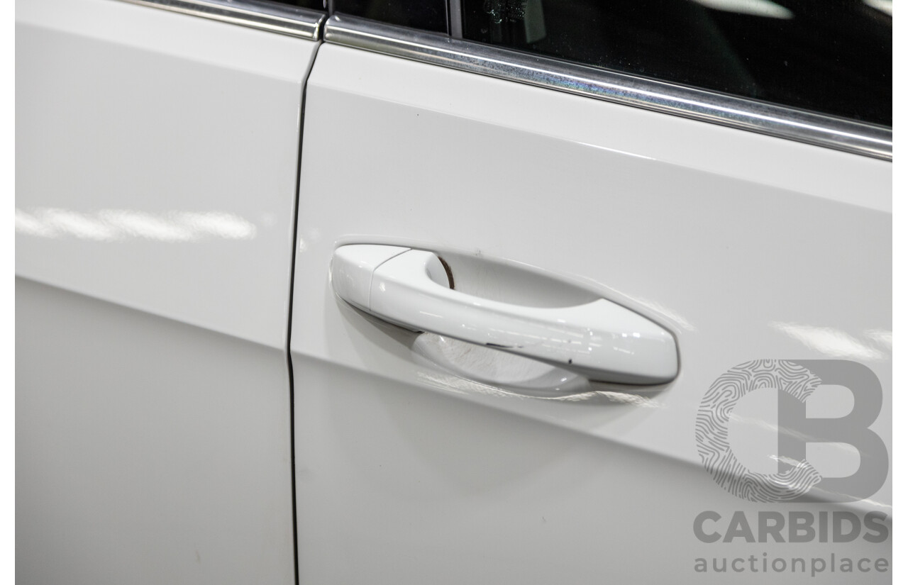 2/2014 Volkswagen Golf 110 TDI Highline MK7 AU MY14 4d Wagon White Turbo Diesel 2.0L