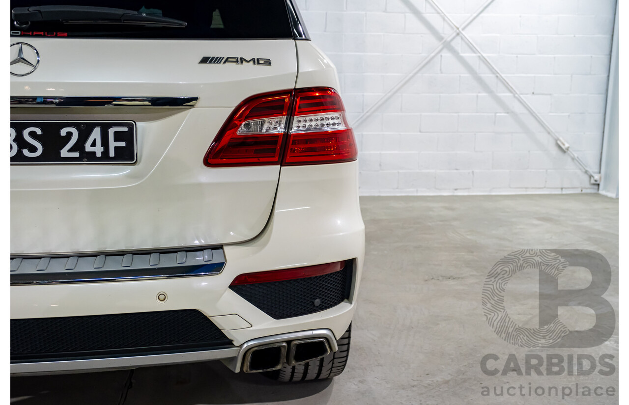 4/2014 Mercedes Benz ML63 AMG (4x4) W166 4d Wagon Diamond White Metallic Twin Turbo V8 5.5L