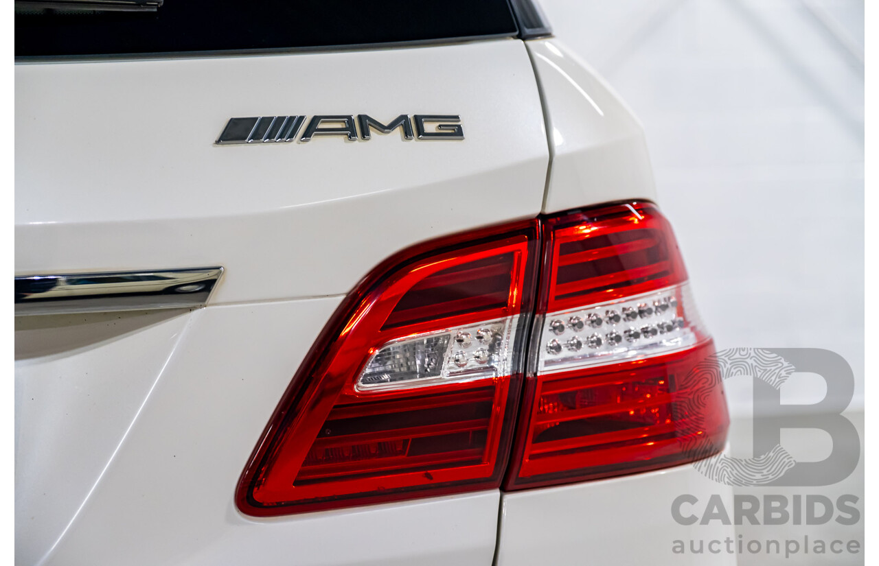 4/2014 Mercedes Benz ML63 AMG (4x4) W166 4d Wagon Diamond White Metallic Twin Turbo V8 5.5L