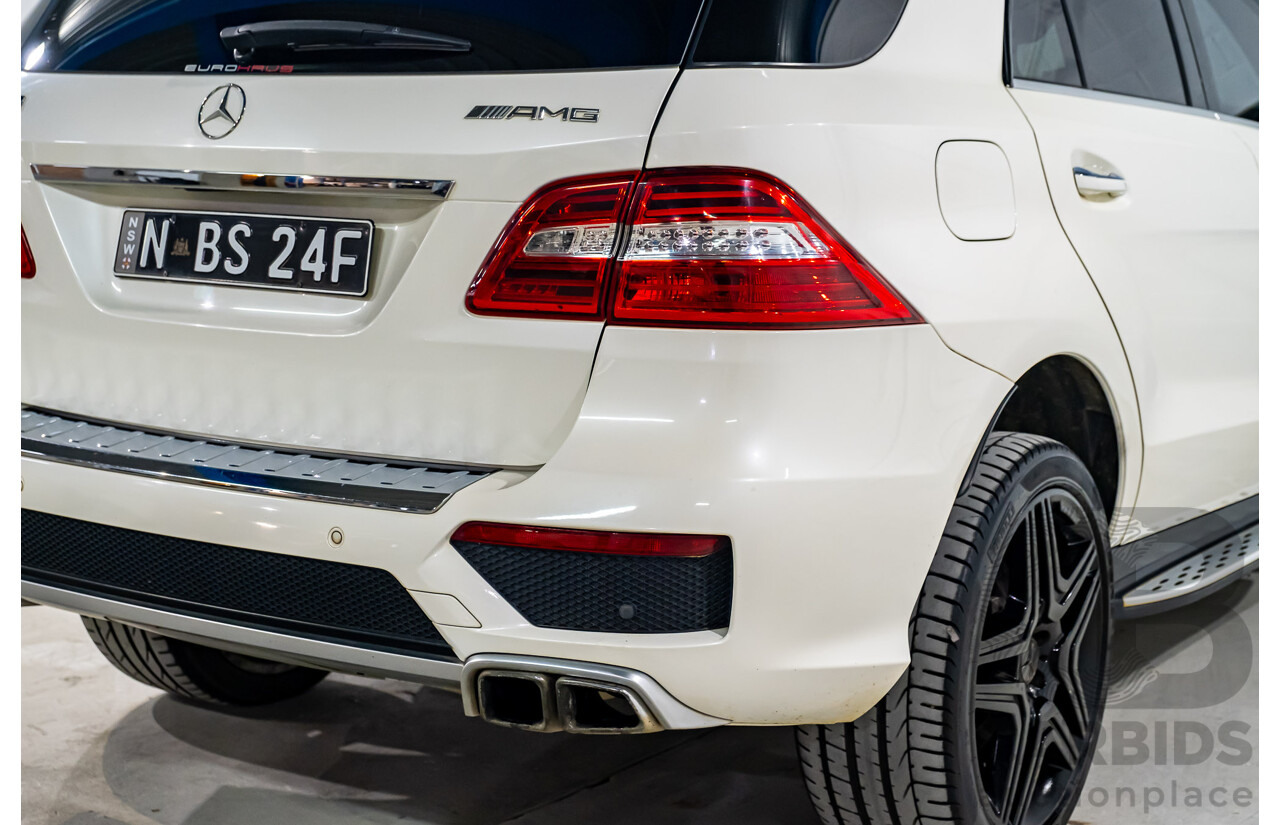 4/2014 Mercedes Benz ML63 AMG (4x4) W166 4d Wagon Diamond White Metallic Twin Turbo V8 5.5L