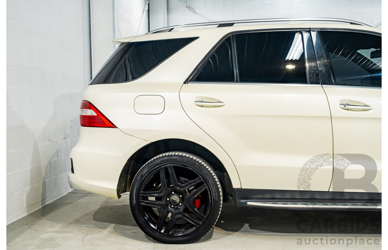 4/2014 Mercedes Benz ML63 AMG (4x4) W166 4d Wagon Diamond White Metallic Twin Turbo V8 5.5L