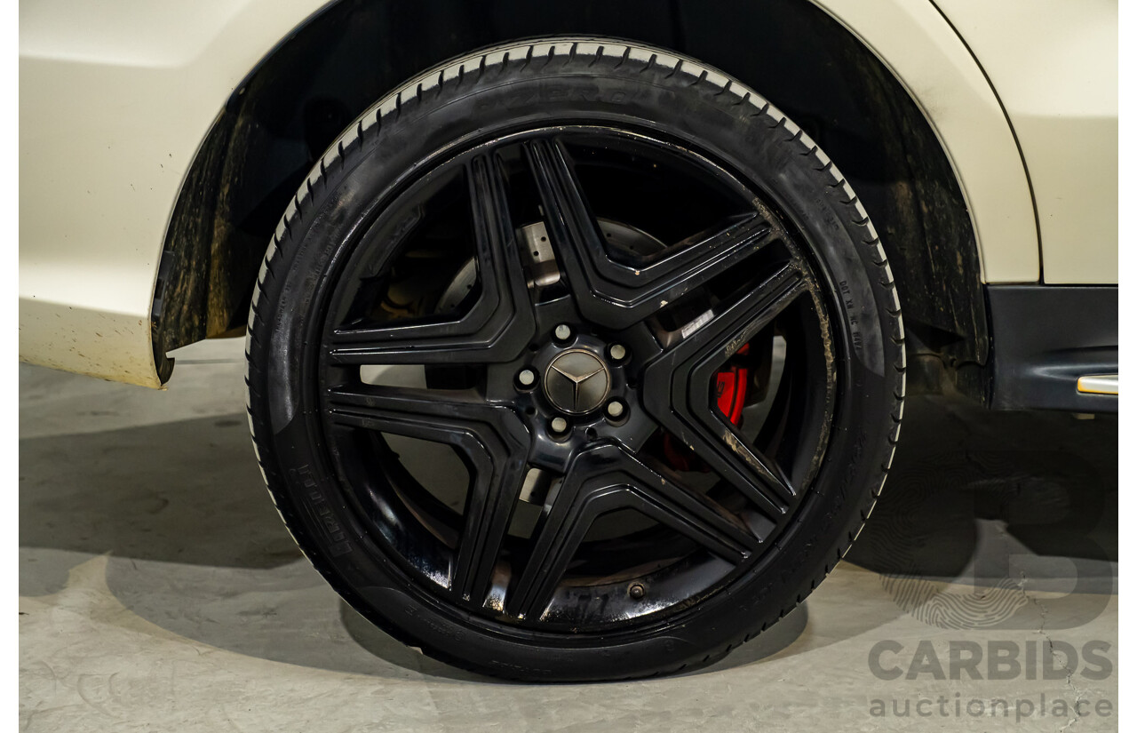 4/2014 Mercedes Benz ML63 AMG (4x4) W166 4d Wagon Diamond White Metallic Twin Turbo V8 5.5L