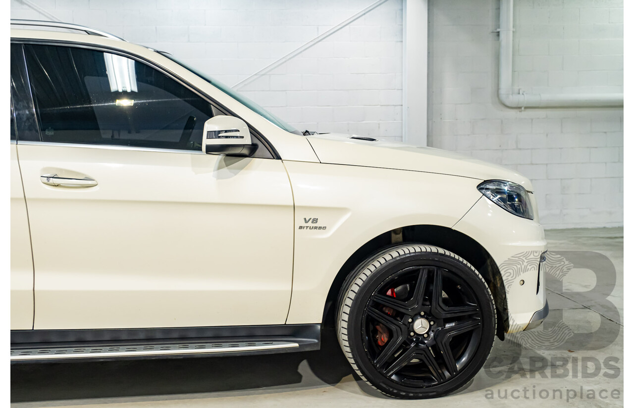 4/2014 Mercedes Benz ML63 AMG (4x4) W166 4d Wagon Diamond White Metallic Twin Turbo V8 5.5L