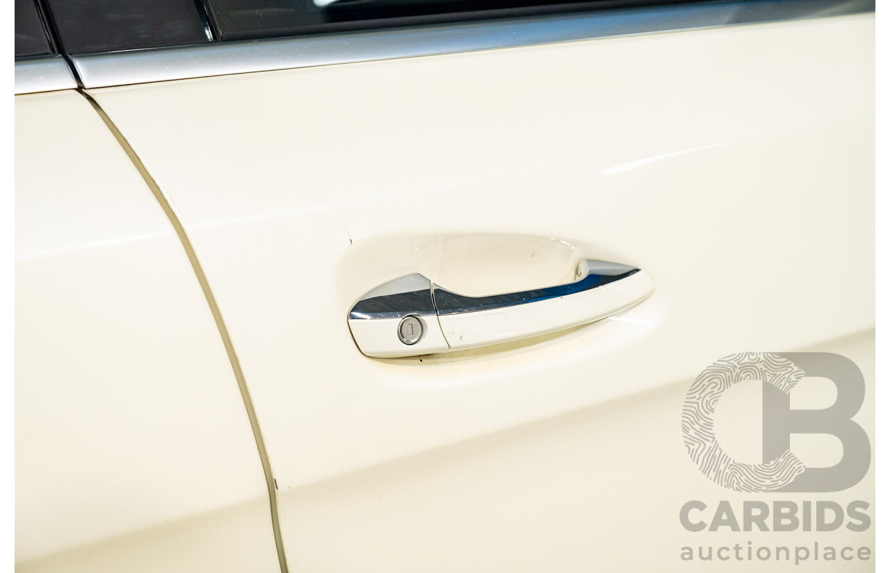 4/2014 Mercedes Benz ML63 AMG (4x4) W166 4d Wagon Diamond White Metallic Twin Turbo V8 5.5L