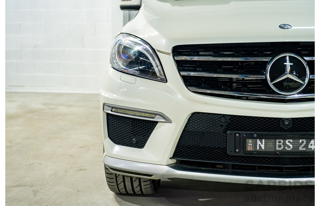 4/2014 Mercedes Benz ML63 AMG (4x4) W166 4d Wagon Diamond White Metallic Twin Turbo V8 5.5L