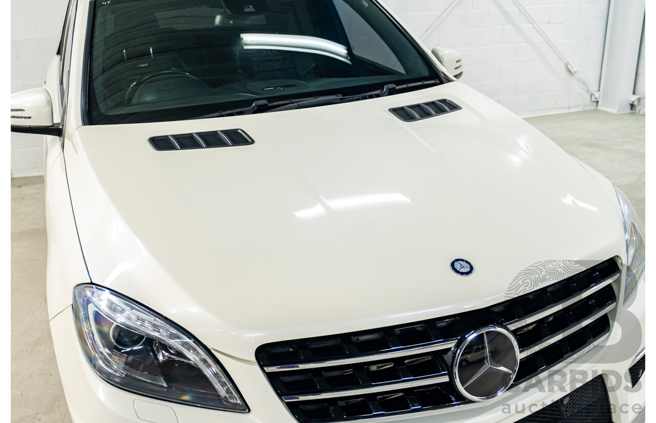 4/2014 Mercedes Benz ML63 AMG (4x4) W166 4d Wagon Diamond White Metallic Twin Turbo V8 5.5L