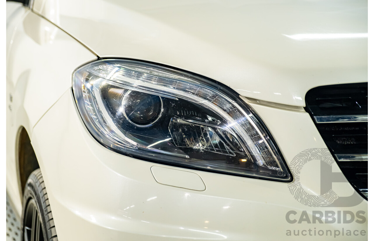 4/2014 Mercedes Benz ML63 AMG (4x4) W166 4d Wagon Diamond White Metallic Twin Turbo V8 5.5L