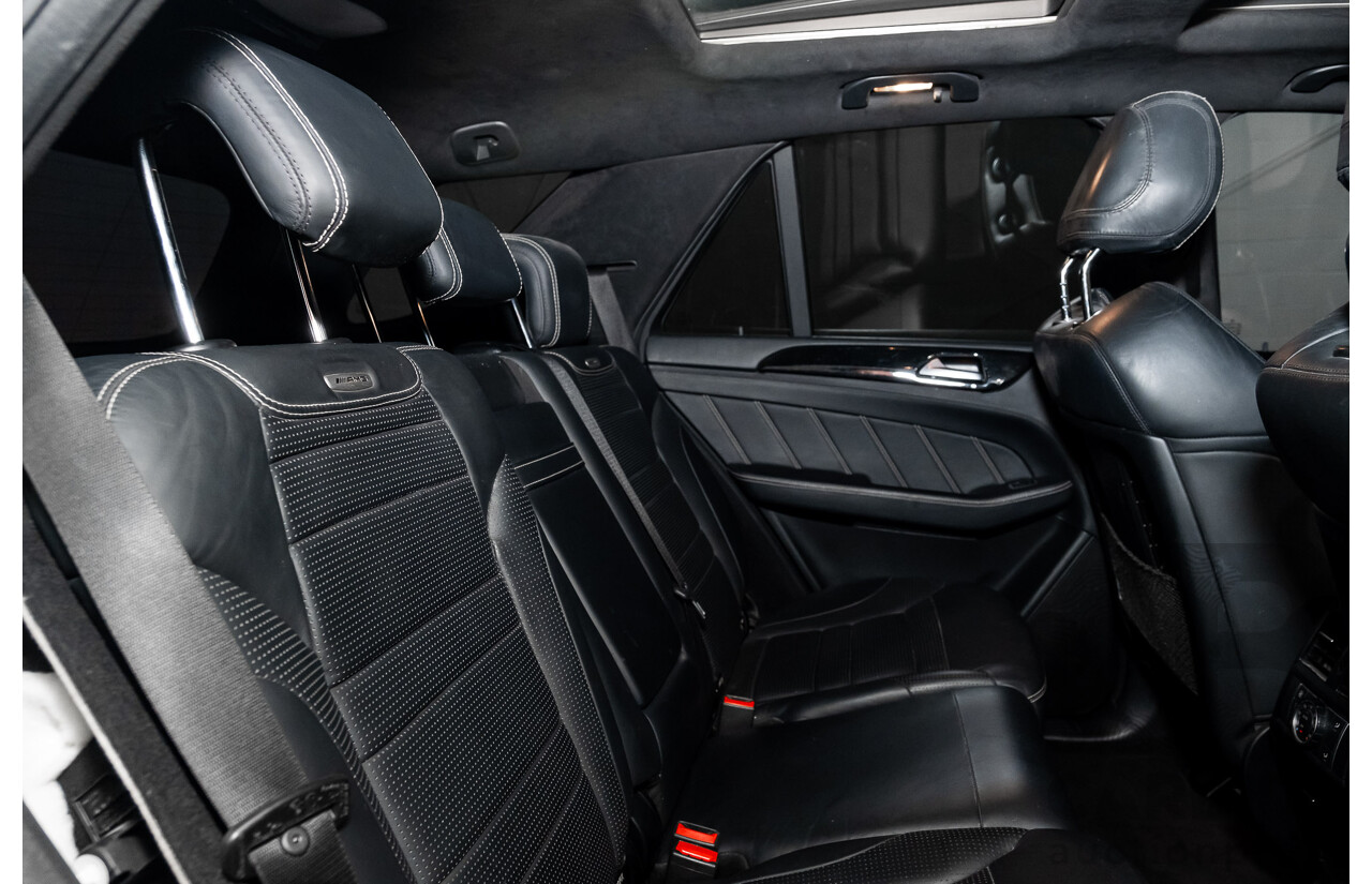 4/2014 Mercedes Benz ML63 AMG (4x4) W166 4d Wagon Diamond White Metallic Twin Turbo V8 5.5L