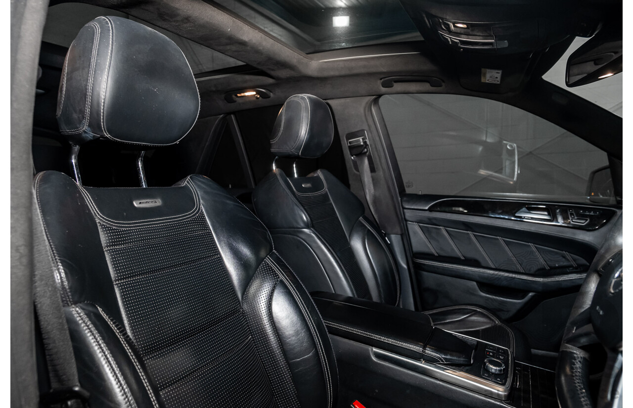 4/2014 Mercedes Benz ML63 AMG (4x4) W166 4d Wagon Diamond White Metallic Twin Turbo V8 5.5L